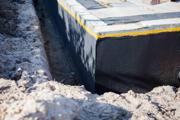 Professional Waterproofing technician working in Comstock Park, MI